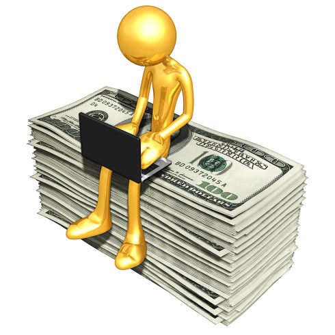 bigstock_Gold_Guy_Online_With_Money_6741622